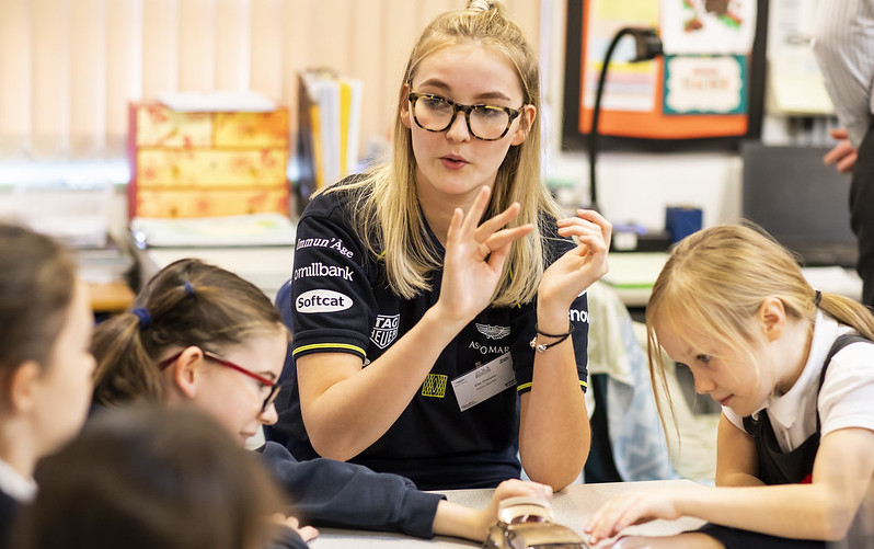 Employee volunteer in classroom