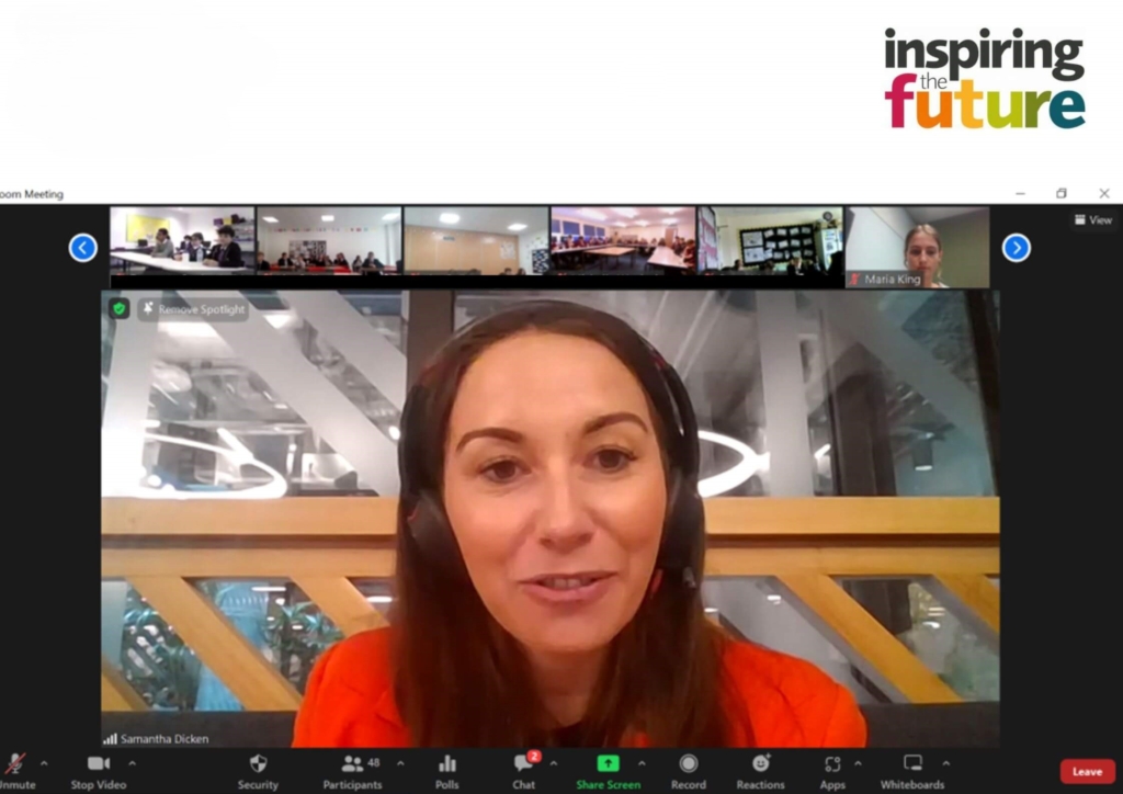 Female workplace volunteer on screen talking virtually to lots of schools at the same time.