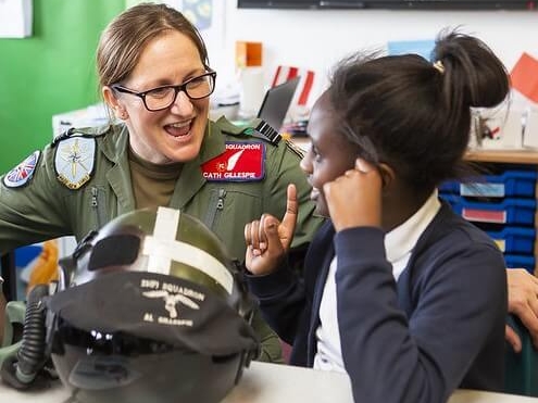 Female pilot engaging with primary pupil one to one