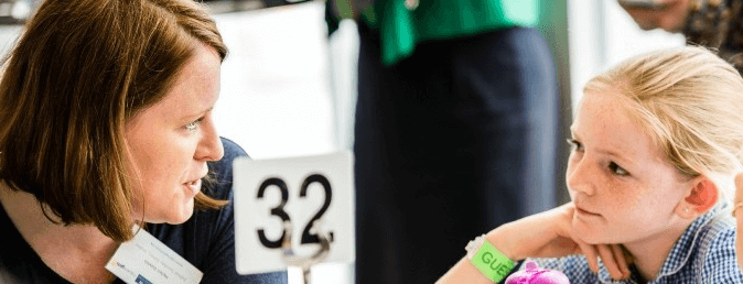 Woman and young girl in conversation